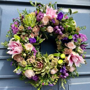Summer Door Wreath designed in shades of pinks and purples available to order to collect or have delivered in Dublin