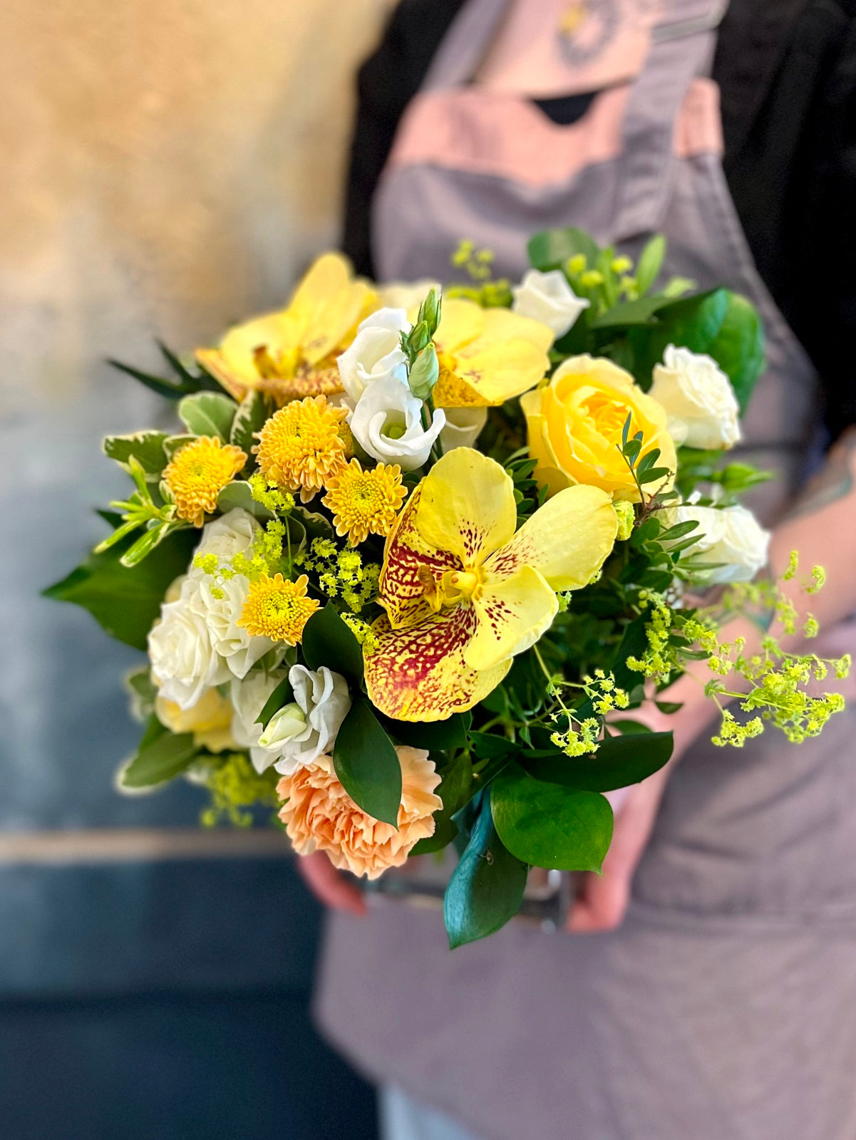 Flower Arrangement in shades of Yellows, Whites and Peaches