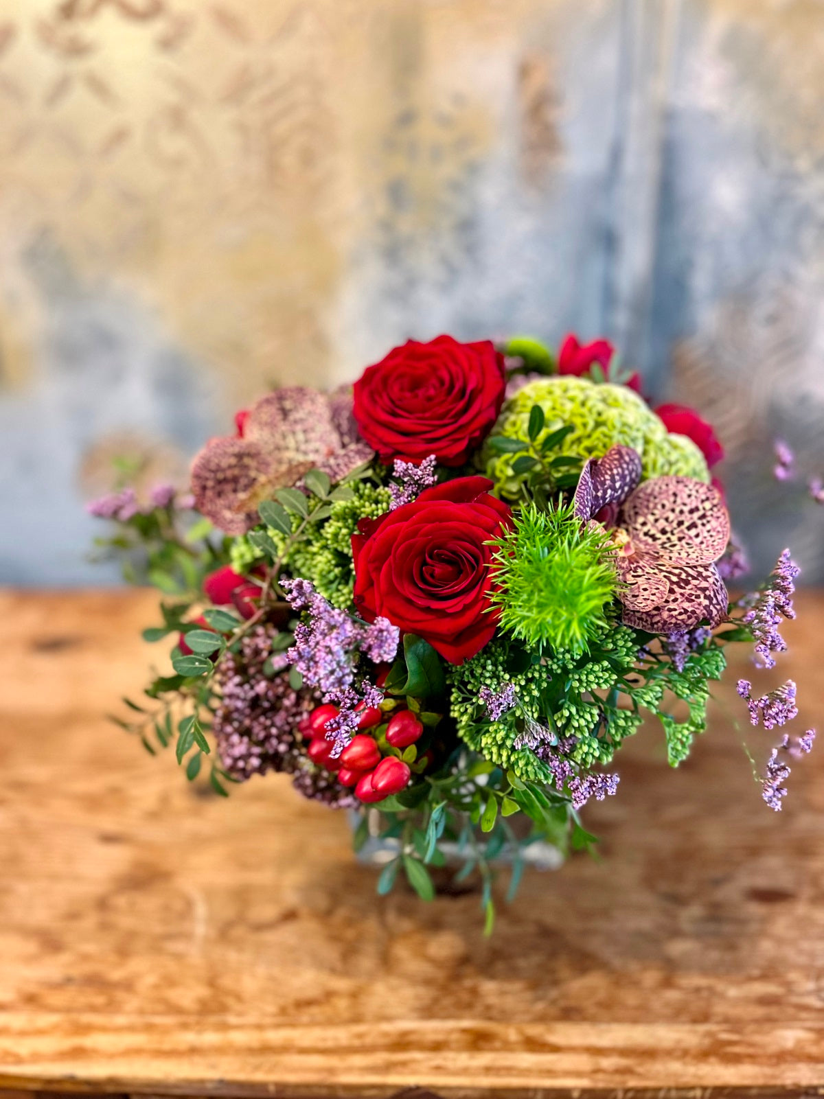 Orchids and Red Roses Flower Arrangement