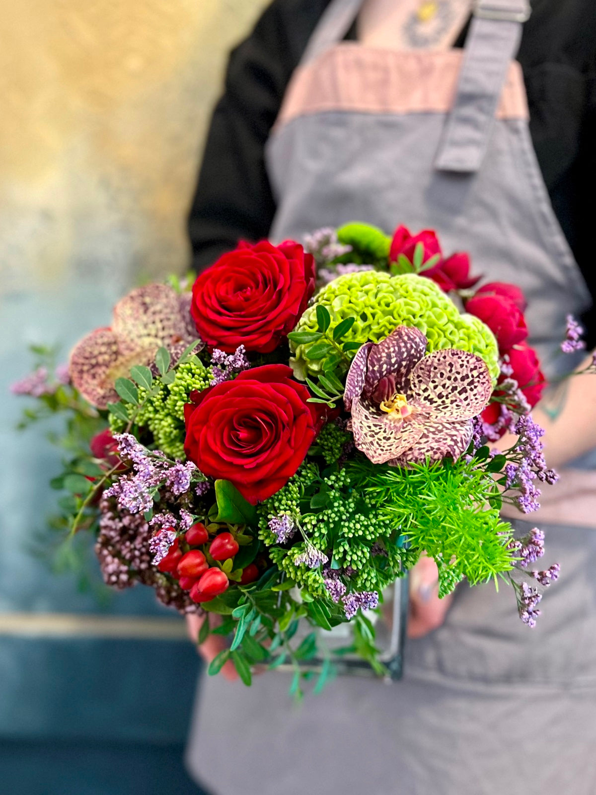 Orchids and Red Roses Flower Arrangement