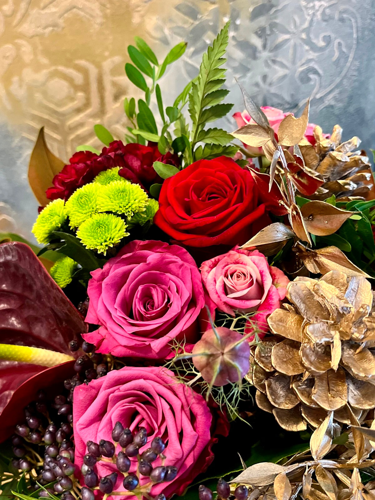 Yuletide Flower Arrangement in Pinks and Reds