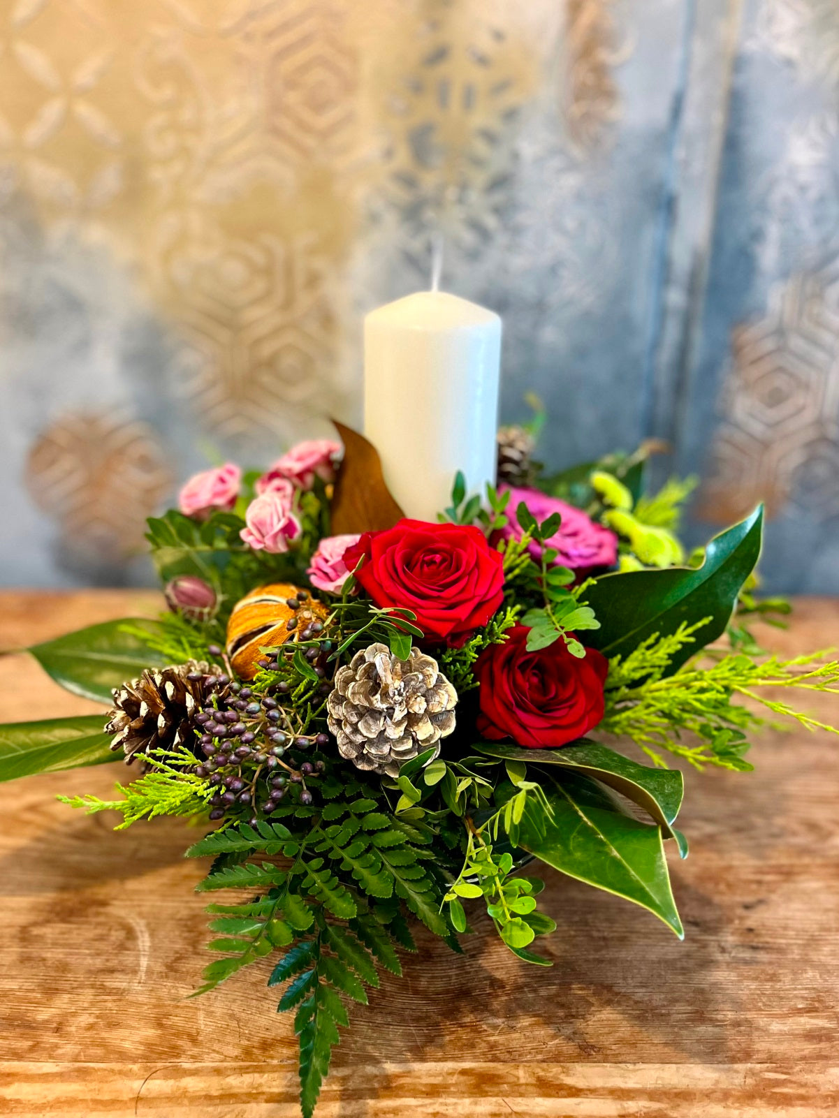 Christmas Candle Red and Pink Flower Arrangement in Ceramic Container