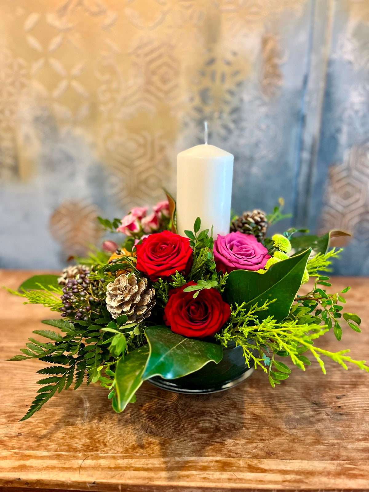 Festive Table Centre in Reds and Pinks in Glass container