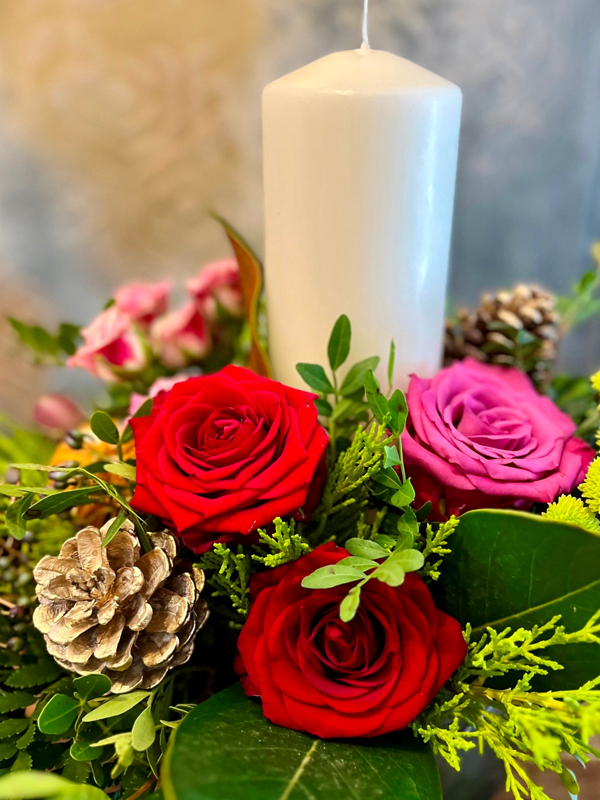 Festive Table Centre in Reds and Pinks in Glass container