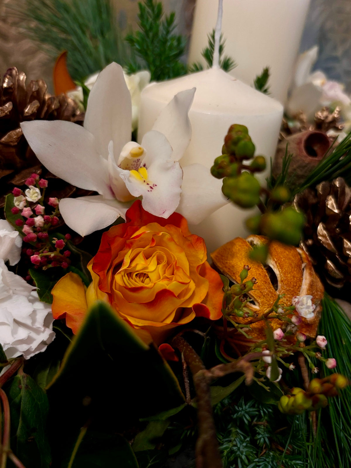 Large Christmas Candle and White Flower Arrangement in Urn