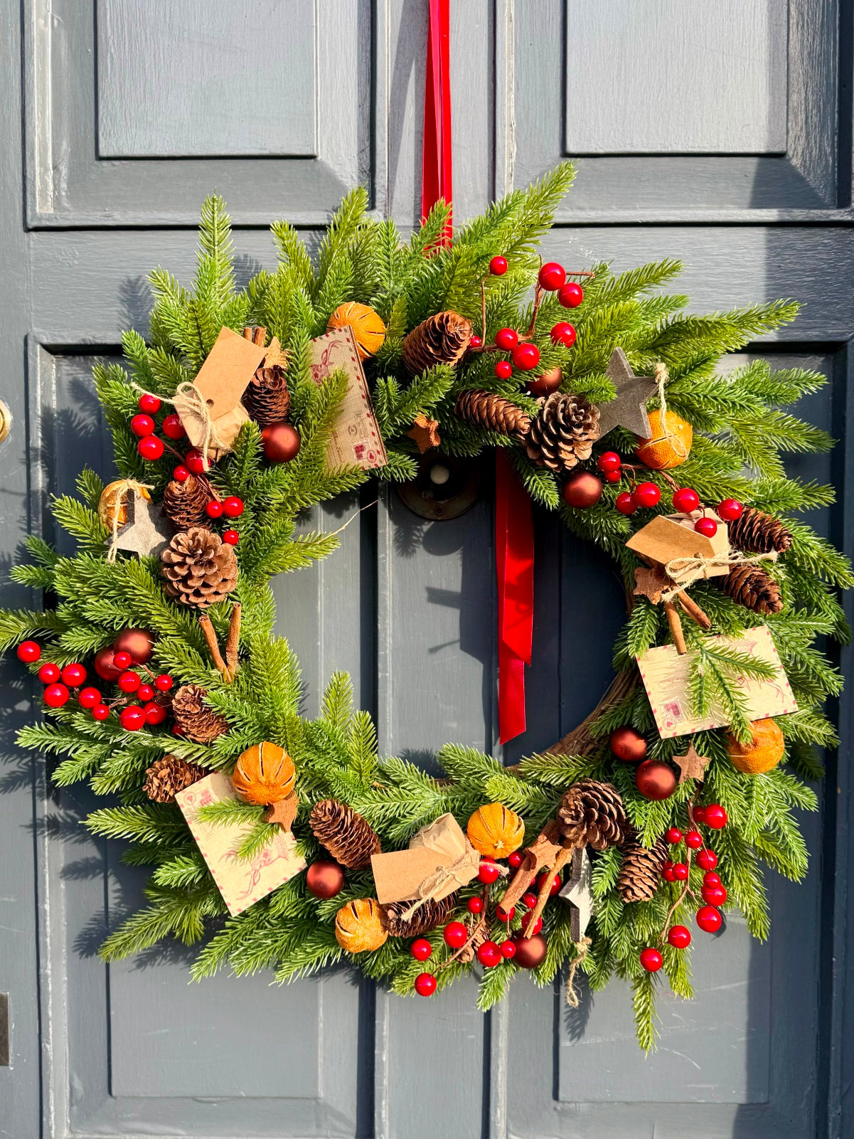 Artifical Christmas Door Wreath in Festive Reds