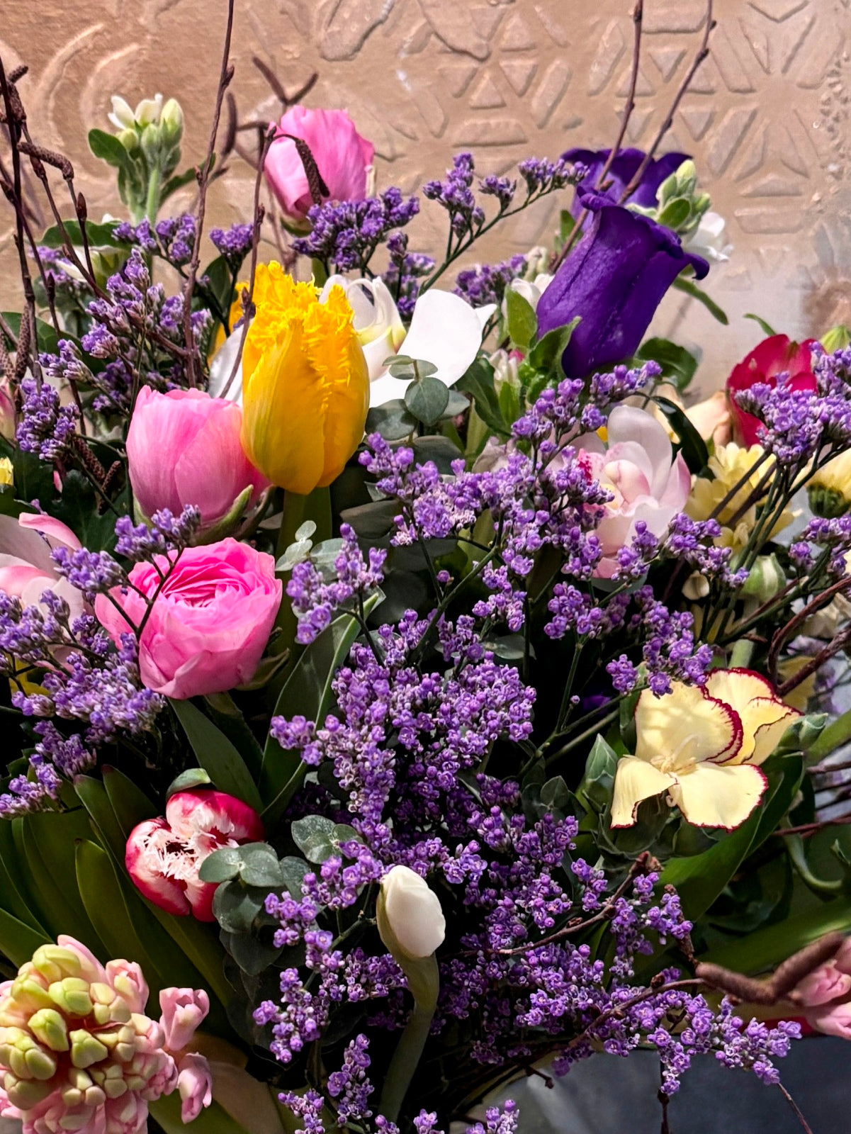 Extravagant Spring Flowers in Goldfish Bowl Vase